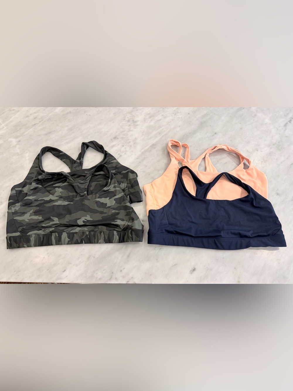 Athleta Three-Pack Racerback Sports Bras in Camo, Peach & Navy
